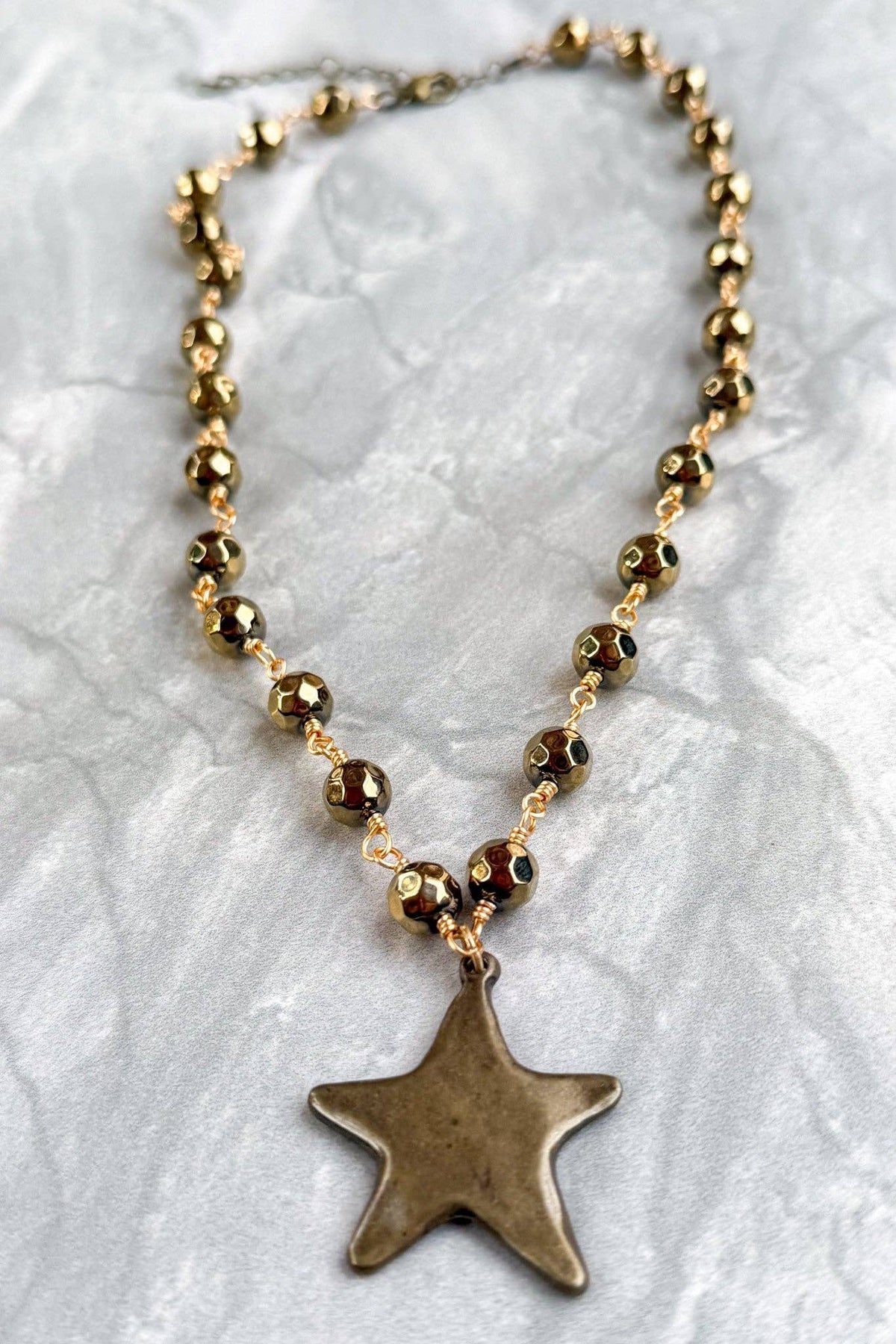 Talus Bronze Star Necklace
