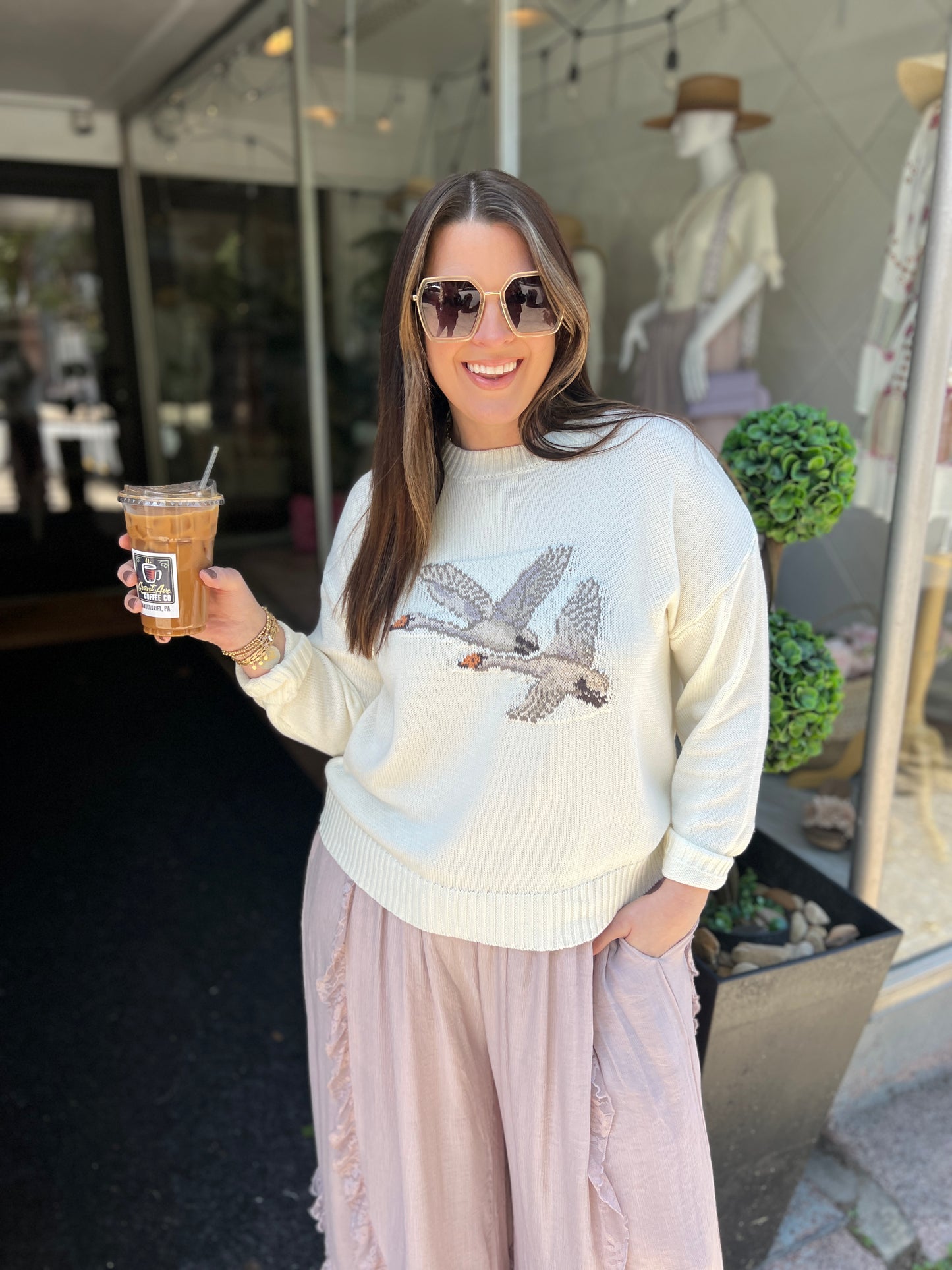Flying Feathers Sweater
