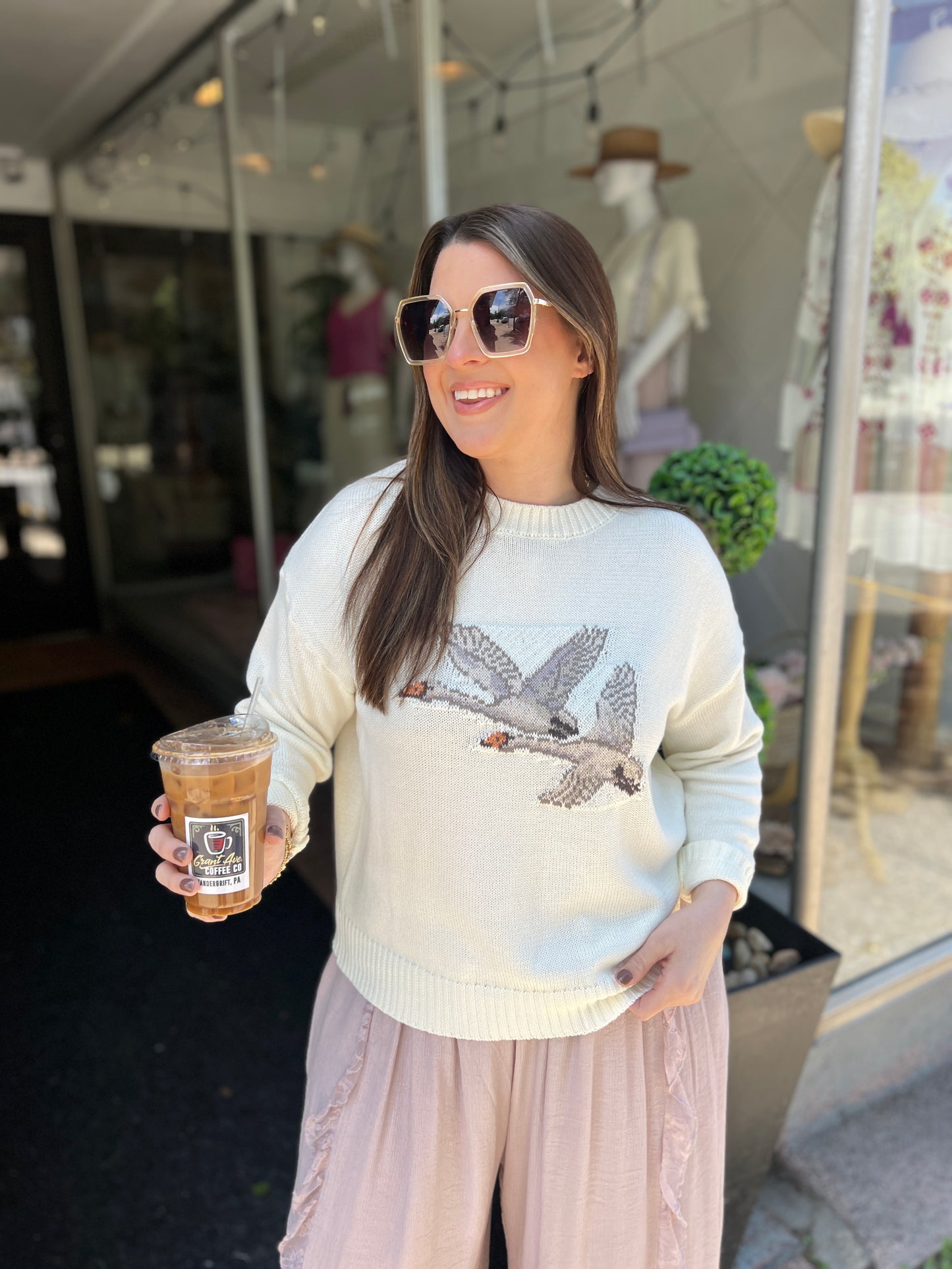 Flying Feathers Sweater